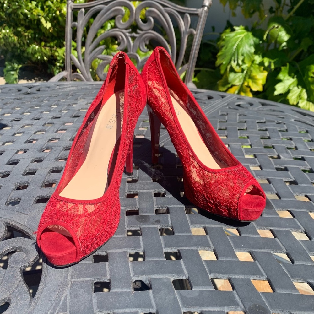 Guess lace with patent leather heels.